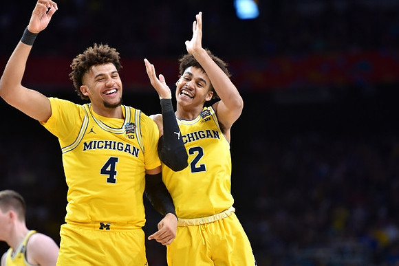 Isaiah Livers (4) and Jordan Poole (2)