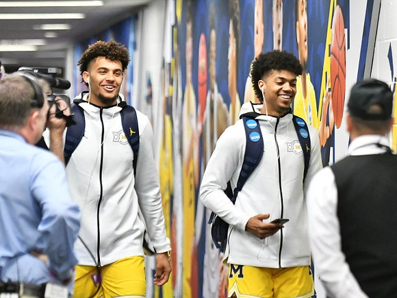 Isaiah Livers (4) and Ibi Watson (23)