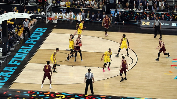 Charles Matthews (1), Moritz Wagner (13), Isaiah Livers (4), Muhammad-Ali Abdur-Rahkman (12), and Zavier Simpson (3)