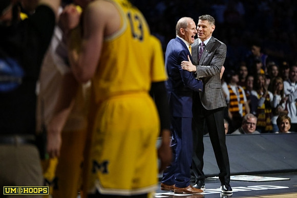 Moritz Wagner (13), John Beilein, and Loyola Chicago Head Coach Porter Moser