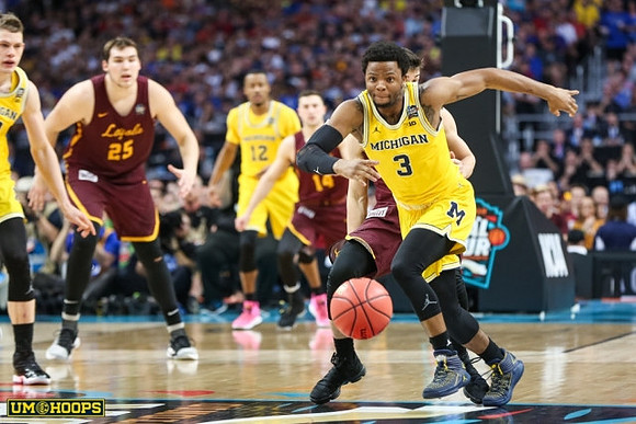 Muhammad-Ali Abdur-Rahkman (12), Zavier Simpson (3), and Jordan Poole (2)