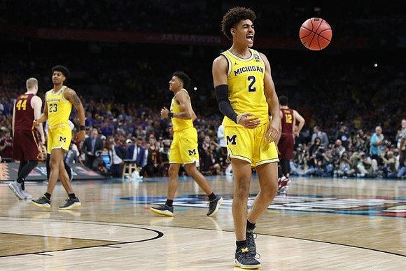 Ibi Watson (23), Eli Brooks (55), and Jordan Poole (2)