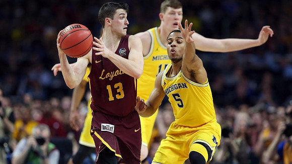 Jaaron Simmons (5) and Jon Teske (15)