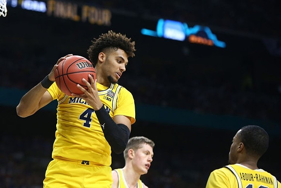 Isaiah Livers (4), Moritz Wagner (13), and Muhammad-Ali Abdur-Rahkman (12)
