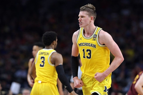 Zavier Simpson (3) and Moritz Wagner (13)