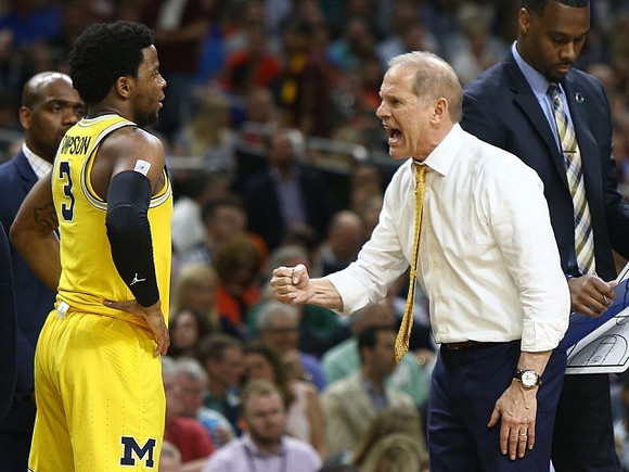 Deandre Haynes, Zavier Simpson (3), and John Beilein