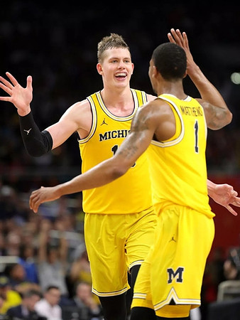 Moritz Wagner (13) and Charles Matthews (1)