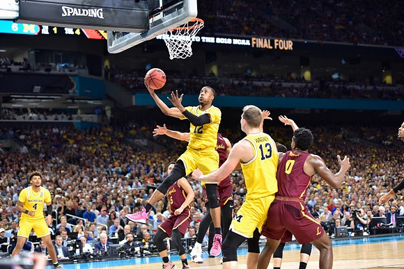 Isaiah Livers (4), Muhammad-Ali Abdur-Rahkman (12), and Moritz Wagner (13)