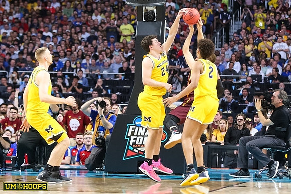 Austin Davis (51), C.J. Baird (24), and Jordan Poole (2)