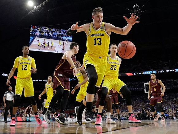 Muhammad-Ali Abdur-Rahkman (12), Jaaron Simmons (5), Charles Matthews (1), Duncan Robinson (22), and Moritz Wagner (13)