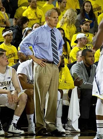 Matt Vogrich (13), John Beilein, and Jon Horford (15)