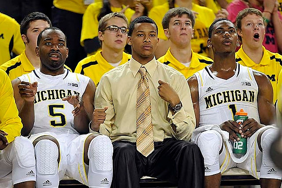 Eso Akunne (5), Trey Burke (3), and Glenn Robinson III (1)