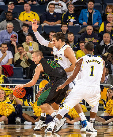 Mitch McGary (4) and Glenn Robinson III (1)
