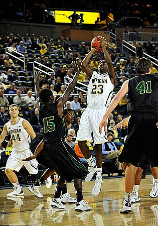 Max Bielfeldt (44) and Caris LeVert (23)