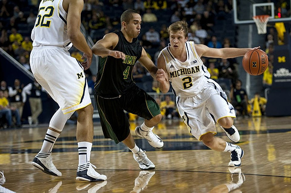 Jordan Morgan (52) and Spike Albrecht (2)