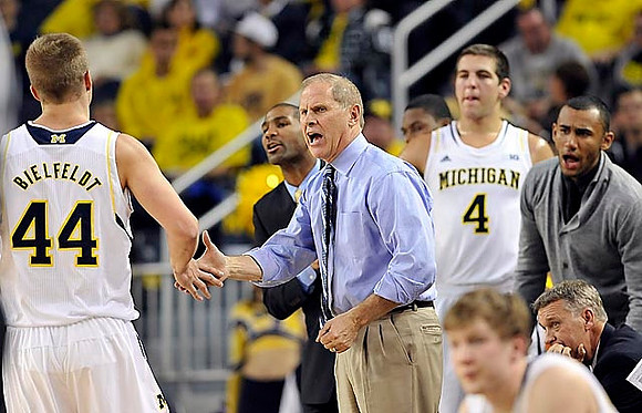 Max Bielfeldt (44), LaVall Jordan, John Beilein, Mitch McGary (4), Jon Horford (15), Jeff Meyer, and Matt Vogrich (13)