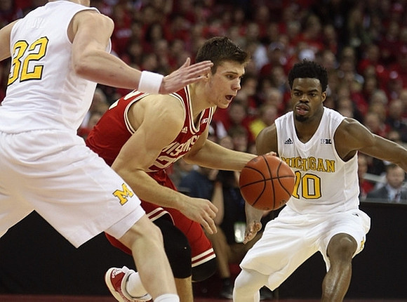 Ricky Doyle (32) and Derrick Walton Jr. (10)