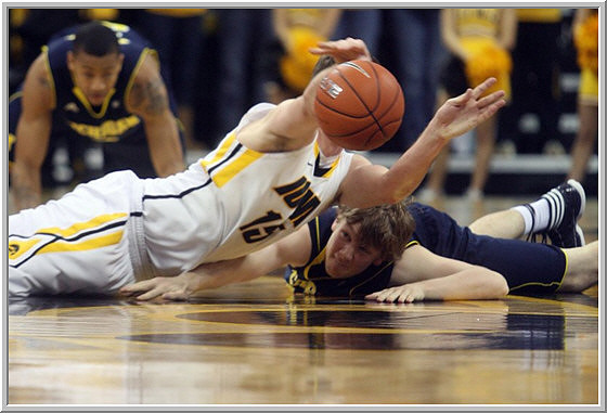 Trey Burke (3) and Matt Vogrich (13)
