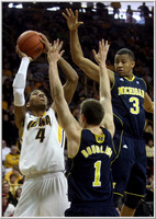 Stu Douglass (1) and Trey Burke (3)