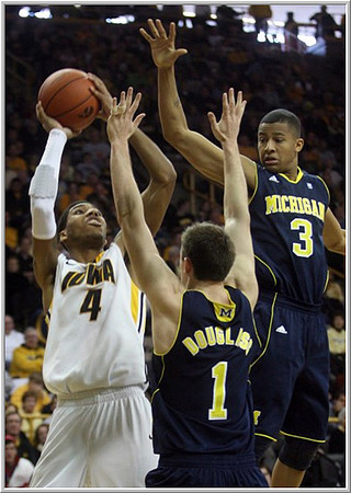 Stu Douglass (1) and Trey Burke (3)