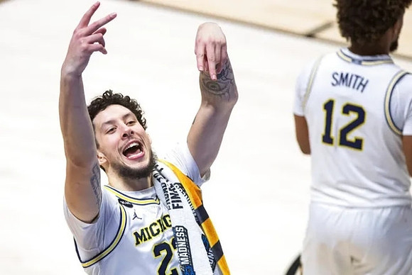 Brandon Johns Jr. (23) and Mike Smith (12)