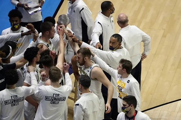 Juwan Howard and Michigan Team
