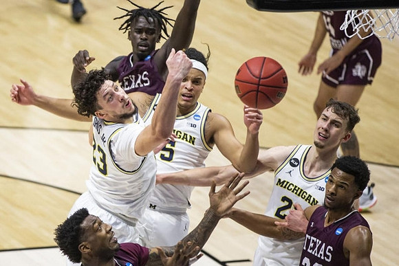 Brandon Johns Jr. (23), Terrance Williams II (5), and Franz Wagner (21)