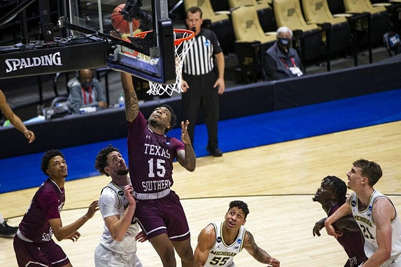 Brandon Johns Jr. (23), Eli Brooks (55), and Franz Wagner (21)