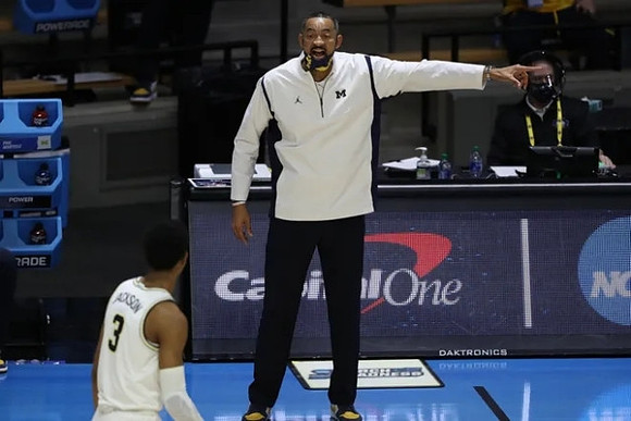 Zeb Jackson (3) and Juwan Howard