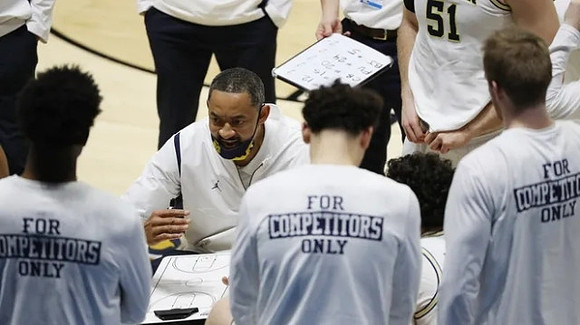 Juwan Howard and Michigan Team