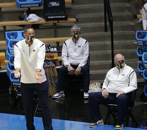 Juwan Howard and Phil Martelli