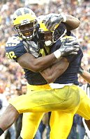 Braylon Edwards (1) and Tim Massaquoi (88)