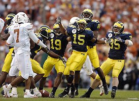 Steve Breaston (15), Brian Thompson (35), and Willis Barringer (19)