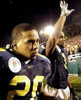 Michael Hart (20) and Braylon Edwards (1)