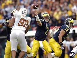 Chad Henne (7), Steve Breaston (15), David Baas (75), and Mike Kolodziej (76)