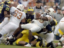 Pierre Woods (99), Leon Hall (29), and Scott McClintock (36)