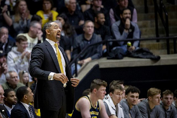 Juwan Howard and Michigan Team