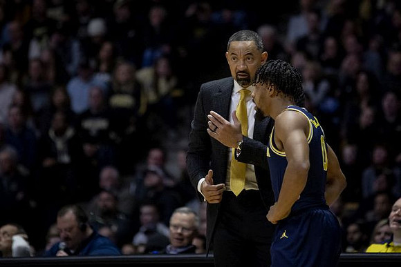 Juwan Howard and David DeJulius (0)