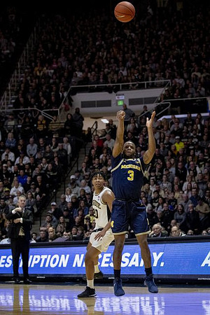 Purdue Head Coach Matt Painter  and Zavier Simpson (3)