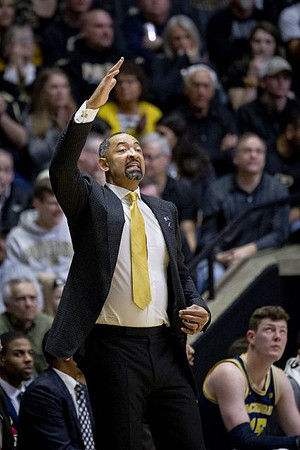Juwan Howard and Jon Teske (15)
