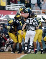 Braylon Edwards (1), Jake Long (77), Jermaine Gonzales (18), and Steve Breaston (15)