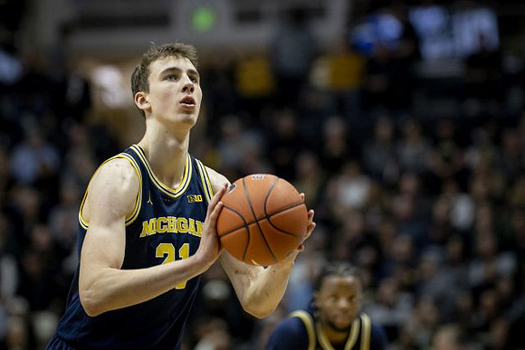 Franz Wagner (21) and Zavier Simpson (3)