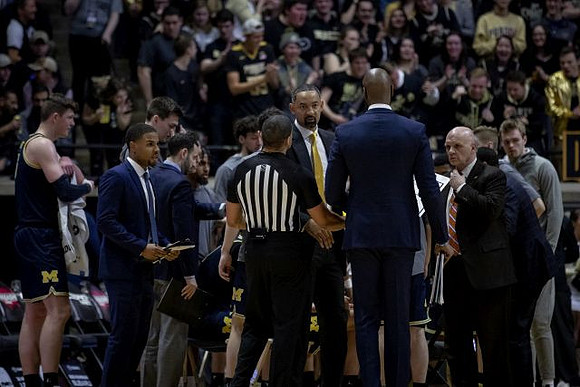 Juwan Howard and Michigan Team