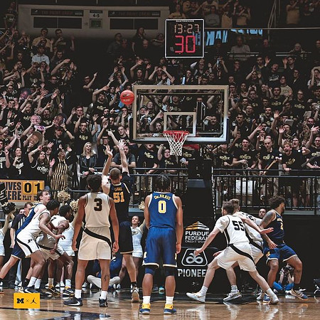 Franz Wagner (21), Austin Davis (51), David DeJulius (0), and Isaiah Livers (2)