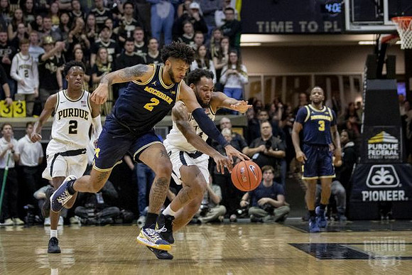 Isaiah Livers (2) and Zavier Simpson (3)