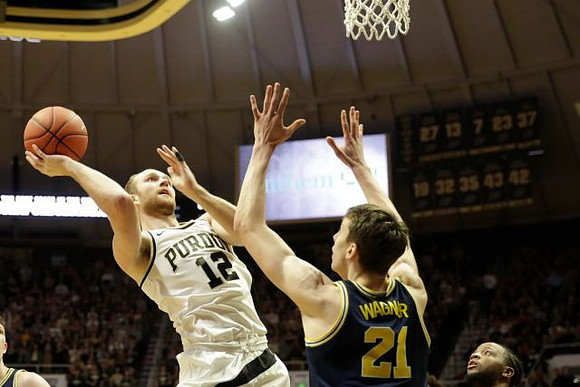 Franz Wagner (21) and Zavier Simpson (3)