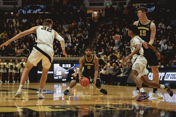 David DeJulius (0) and Jon Teske (15)