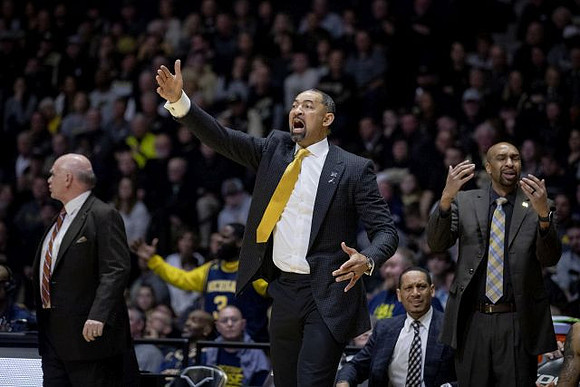 Phil Martelli, Juwan Howard, Howard Eisley, and Saddi Washington