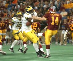 Pierre Woods (99) and Brandon Williams (12)