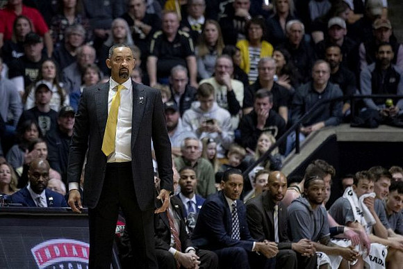 Juwan Howard and Michigan Team